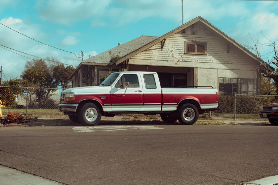 A neighbor&rsquo;s pickup truck parked outside a house, ready to haul