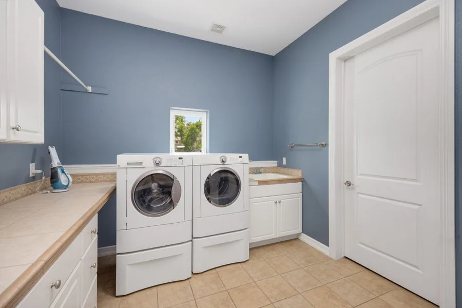 New appliances installed in a clean laundry room