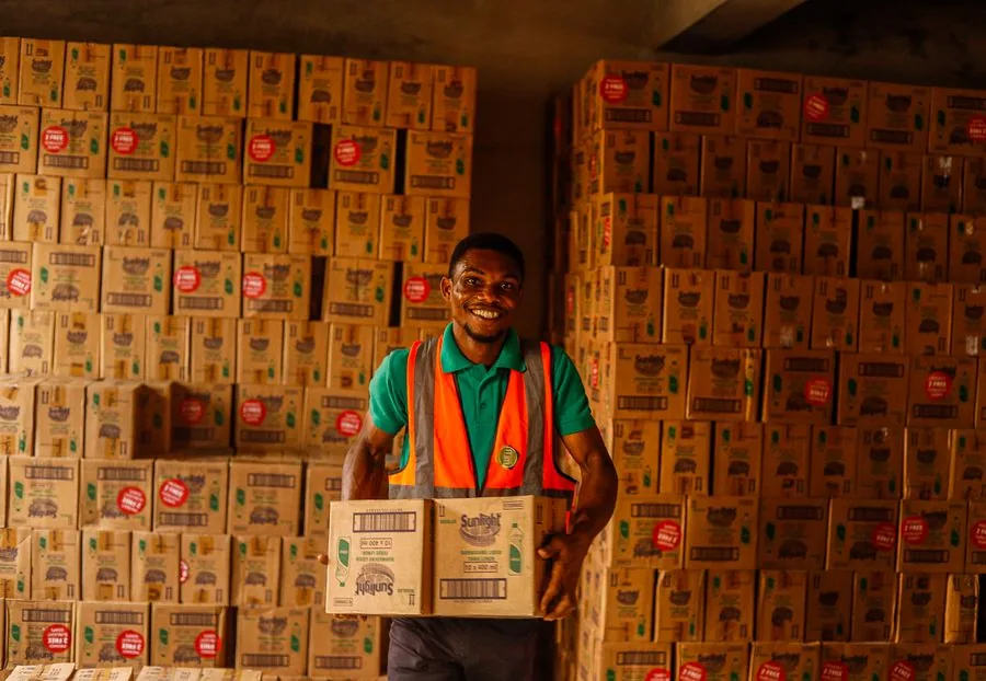 A friendly worker ready to lend a hand with boxes