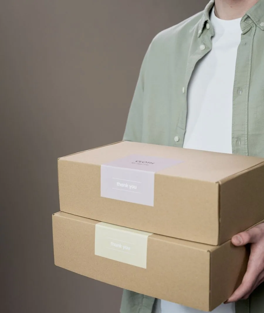 Someone heading out with packages to run errands